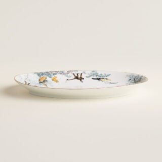 Hermès Carnets d'Equateur Medium Oval Platter shown on table | Kneen & Co