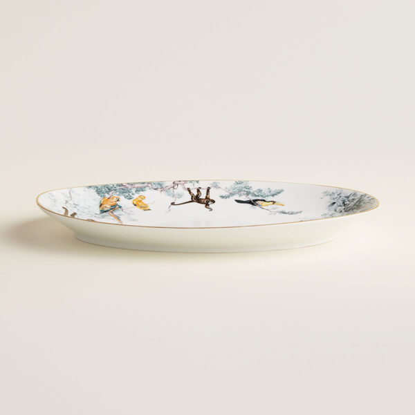 Hermès Carnets d'Equateur Medium Oval Platter shown on table | Kneen & Co