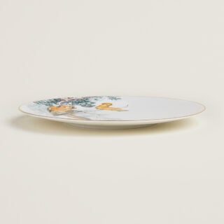Hermès Carnets d'Equateur Birds Dinner Plate shown on table | Kneen & Co