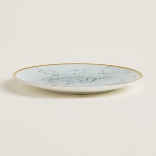 Hermès Carnets d'Equateur Felines Bread and Butter Plate shown on table | Kneen & Co