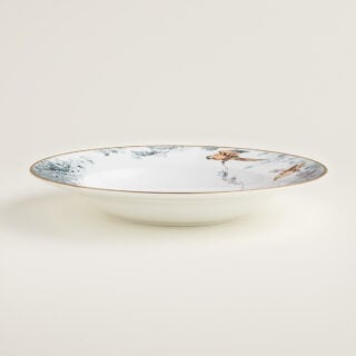 Hermès Carnets d'Equateur Soup Plate shown on table | Kneen & Co