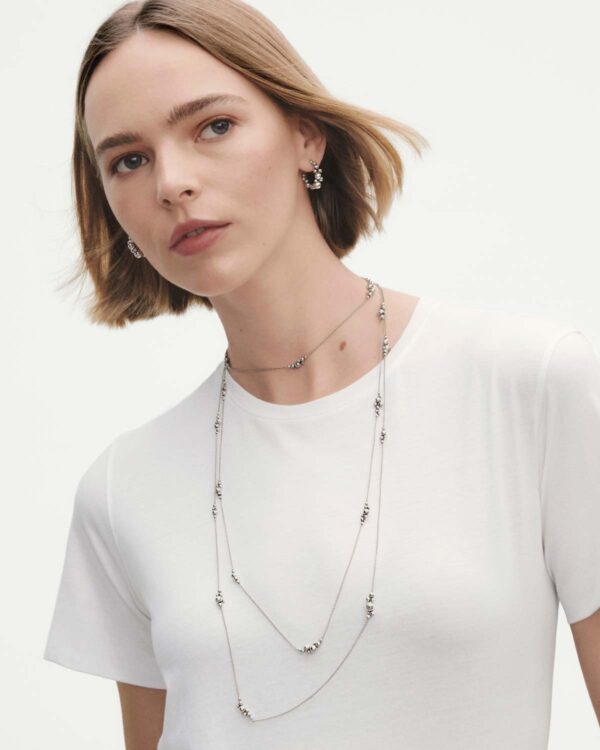 GJ-AW24-Moonlight-Grapes-20001598-1200w-100KB (2) Woman wearing Georg Jensen Moonlight Grapes Sautoir in sterling silver | Kneen & Co