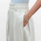 Woman wearing Georg Jensen Moonlight Grapes Bangle in sterling silver | Kneen & Co