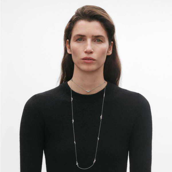 GJ-SS25-ECOM-SHOOT-MOONLIGHT-GRAPES-NECKLACE-20001674-1200w-100KB Woman wearing Georg Jensen Moonlight Grapes Sautoir in sterling silver | Kneen & Co