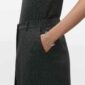 Woman wearing Georg Jensen Offspring Bracelet in sterling silver | Kneen & Co