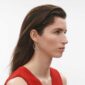 Georg Jensen Offspring Double Earhoops in sterling silver on model wearing red dress | Kneen & Co