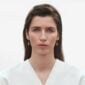 Georg Jensen Offspring Earring in 18 ct yellow gold on model | Kneen & Co
