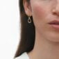 Georg Jensen Offspring Earrings in 18 kt. yellow gold with .05 ct diamonds close up on model | Kneen & Co