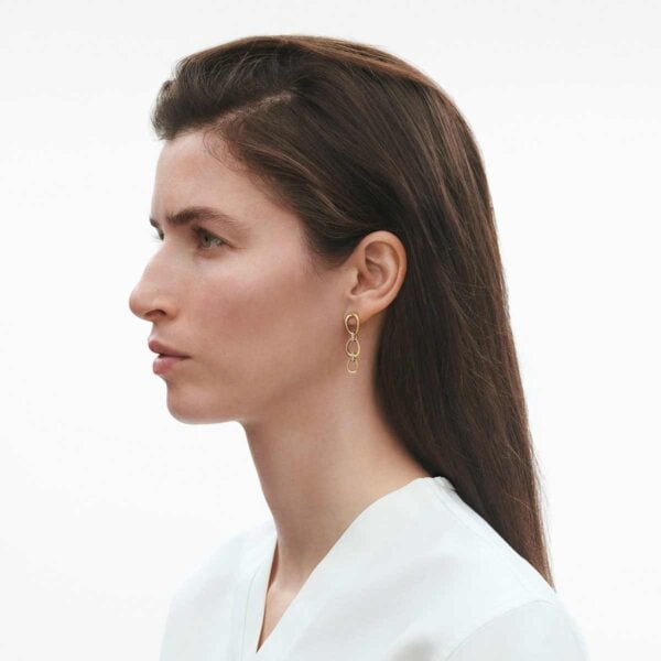 GJ-SS25-ECOM-SHOOT-OFFSPRING-EARRING-20001753-1-1200w-100KB Georg Jensen Offspring Earrings Gold with Pavé Diamonds .11ct on model | Kneen & Co