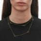 Woman wearing Georg Jensen OFFSPRING Sautoir in 18 kt. yellow gold | Kneen & Co