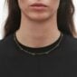 Woman wearing Georg Jensen Offspring Interlinked Necklace, small in 18 kt yellow gold | Kneen & Co