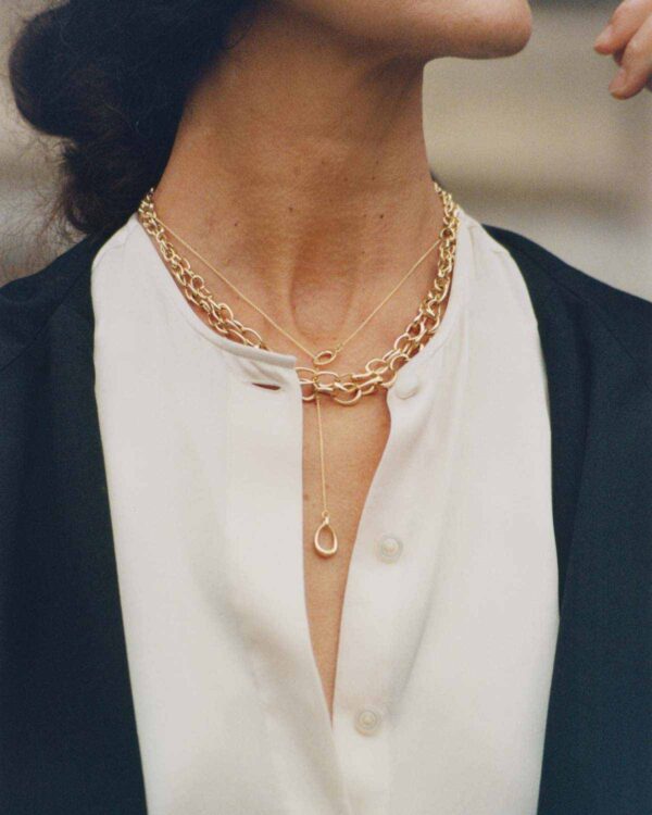 GJ-SS25-OFFSPRING-RABUN-20000993-20001751-3-4X5-1200w-100KB Georg Jensen Offspring Collection Necklaces in gold on model | Kneen & Co