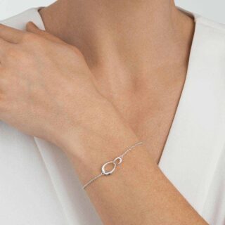 Georg Jensen Offspring Interlocking Bracelet in sterling silver on model | Kneen & Co
