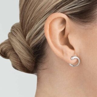 GJENSEN-10015149-MERCY-EARRING-634B-SLVR-1200w-100KB Georg Jensen Mercy Earring 634B in sterling silver shown on model | Kneen & Co