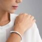 Georg Jensen Offspring Open Bangle Bracelet 433C in Sterling Silver on model | Kneen & Co