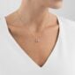 Woman wearing Georg Jensen Offspring Necklace with Pendant, Small in sterling silver | Kneen & Co