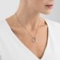 Georg Jensen Offspring Pendant 433B in sterling silver and 18 kt rose gold on model with white shirt | Kneen & Co