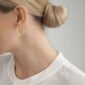 Woman wearing Georg Jensen Offspring Earhoops in sterling silver | Kneen & Co