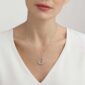 Georg Jensen Offspring Necklace with Pendant, Large 0.08 ct shown in woman in white top | Kneen & Co