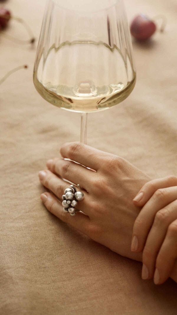 GJ-AW24-CHRSTMS-TACTICAL-JWLRY-MNLTGRAPES-20000388-20001418-9x16-REV-1200w-100KB Georg Jensen Moonlight Grapes Band Ring in Sterling Silver | Kneen & Co