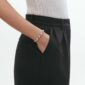 Woman wearing Georg Jensen Reflect Bracelet Silver | Kneen & Co