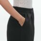 Woman wearing Georg Jensen Reflect Slim Bracelet Gold | Kneen & Co