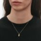 Woman wearing Georg Jensen Reflect Small Pendant Necklace Gold | Kneen & Co