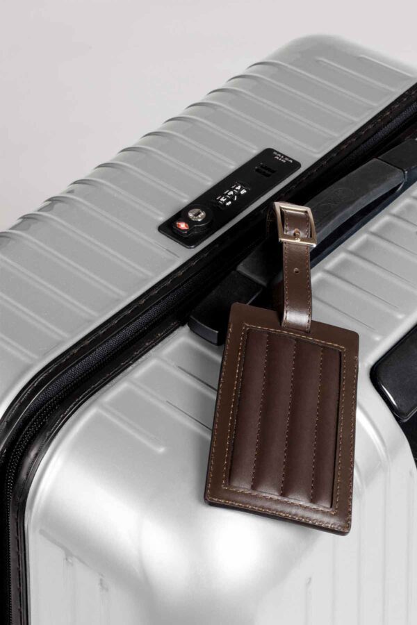 GB-Riviere-LTAG-TC-LuggageTag-Lines-RV25Moka-LIFESTYLE01-1200w-100KB Riviere Leather Luggage Tag | Kneen & Co