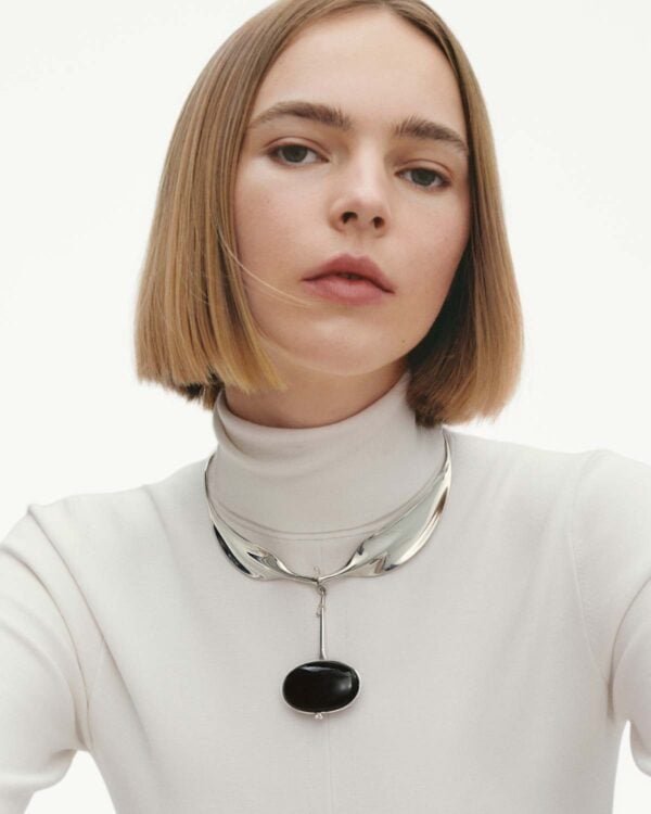 Woman wearing Georg Jensen Vivianna Torun Necklace Silver & Black Agate | Kneen & Co