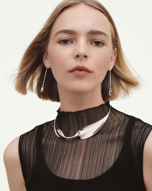 Woman wearing Georg Jensen Vivianna Torun Necklace Silver | Kneen & Co