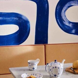 Royal Copenhagen Blue Fluted Plain serveware and tea service set on table | Kneen & Co