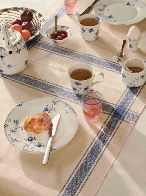 RC-2023-Exclusives-BlueElements-Plate-22cm-HH-Cup-25cl-Teapot-Sugar-Bowl-wSpoon-Egg-Cup-Bowl-10cl-1200w-100KB Royal Copenhagen Blue Elements Tea Service set on table | Kneen & Co