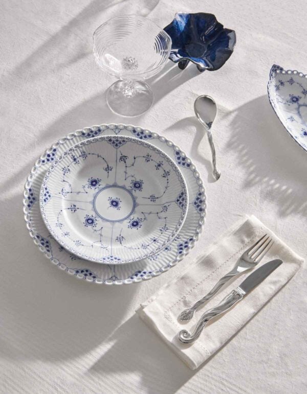 Royal Copenhagen Blue Fluted Full Lace Dinnerware set on table | Kneen & Co
