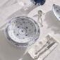 Royal Copenhagen Blue Fluted Full Lace Dinnerware set on table | Kneen & Co