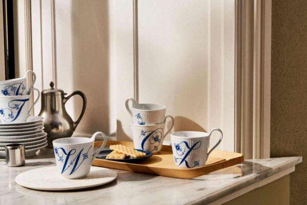 Royal Copenhagen Alphabet Collection set on table | Kneen & Co