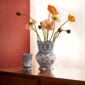 Royal Copenhagen Blue Fluted Full Lace vases with flowers set on ledge | Kneen & Co