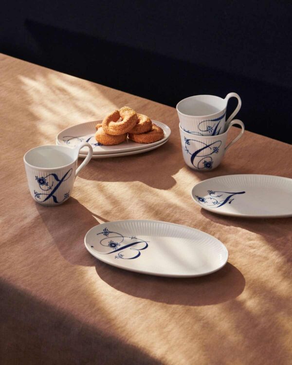 Royal Copenhagen Alphabet Collection set on table | Kneen & Co