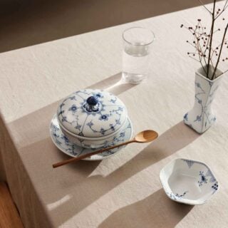 RC-S2-Line-Ext-BlueFluted-Plain-Bowl-wLid-and-Saucer-38cl-Vase-12cm-BlueElements-Bowl-10cl-1200w-100KB Royal Copenhagen Blue Elements Dinnerware set on table | Kneen & Co