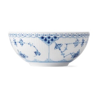 Royal Copenhagen Blue Fluted Half Lace Deep Bowl shown on table | Kneen & Co