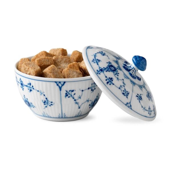 Royal Copenhagen Blue Fluted Plain Sugar Bowl with Lid shown on table | Kneen & Co