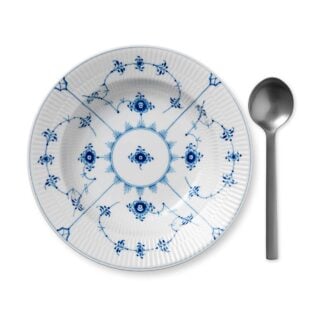 Royal Copenhagen Blue Fluted Plain Medium Deep Plate shown on table | Kneen & Co