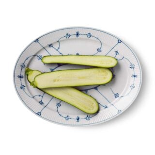 Royal Copenhagen Blue Fluted Plain Medium Oval Dish shown on table | Kneen & Co