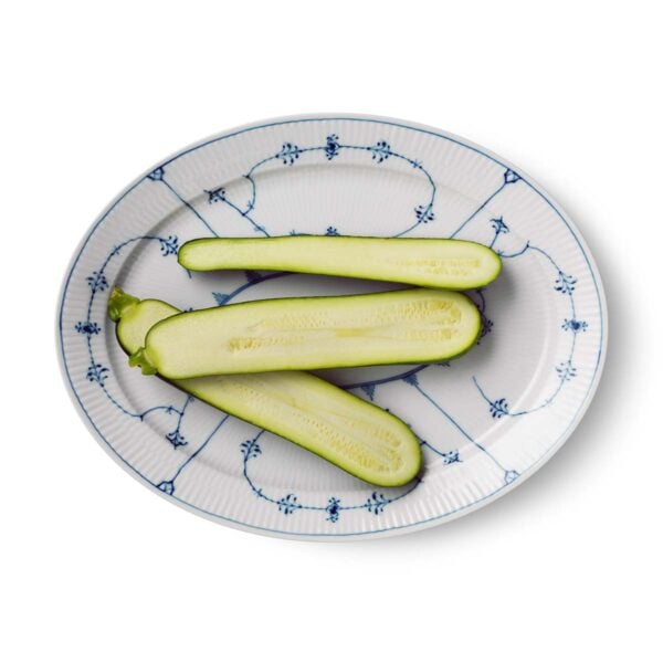 Royal Copenhagen Blue Fluted Plain Medium Oval Dish shown on table | Kneen & Co