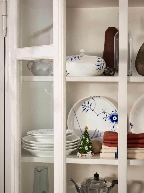 Royal Copenhagen Blue Fluted Mega Dinnerware in cabinet | Kneen & Co