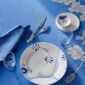 Royal Copenhagen Blue Fluted Mega dinnerware on table | Kneen & Co