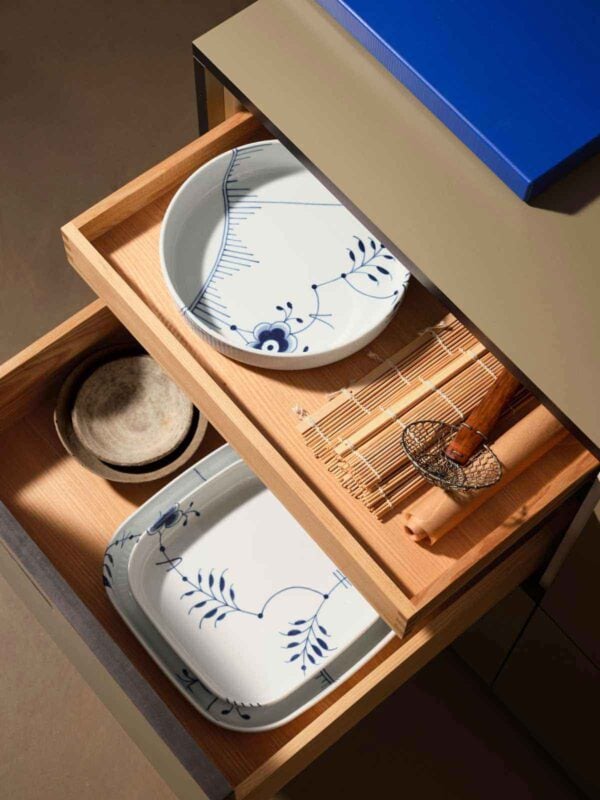 Royal Copenhagen Blue Fluted Mega Dinnerware set in kitchen drawer | Kneen & Co