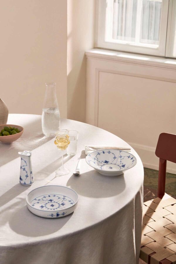 S1_2024_Line_Extensions_Blue_Fluted_Plain_Deep_Plate_21cm_Sauce_Jug_with_Lid_Ovenware_Round_18,5cm_300dpi Royal Copenhagen Blue Fluted Plain Dinnerware set on table | Kneen & Co