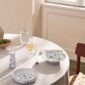 Royal Copenhagen Blue Fluted Plain Dinnerware set on table | Kneen & Co