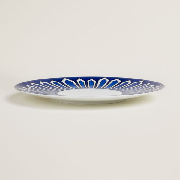 Hermès Bleus D’Ailleurs American Dinner Plate shown on table | Kneen & Co