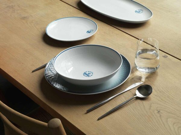 Royal Copenhagen Blueline Dinnerware set on table | Kneen & Co